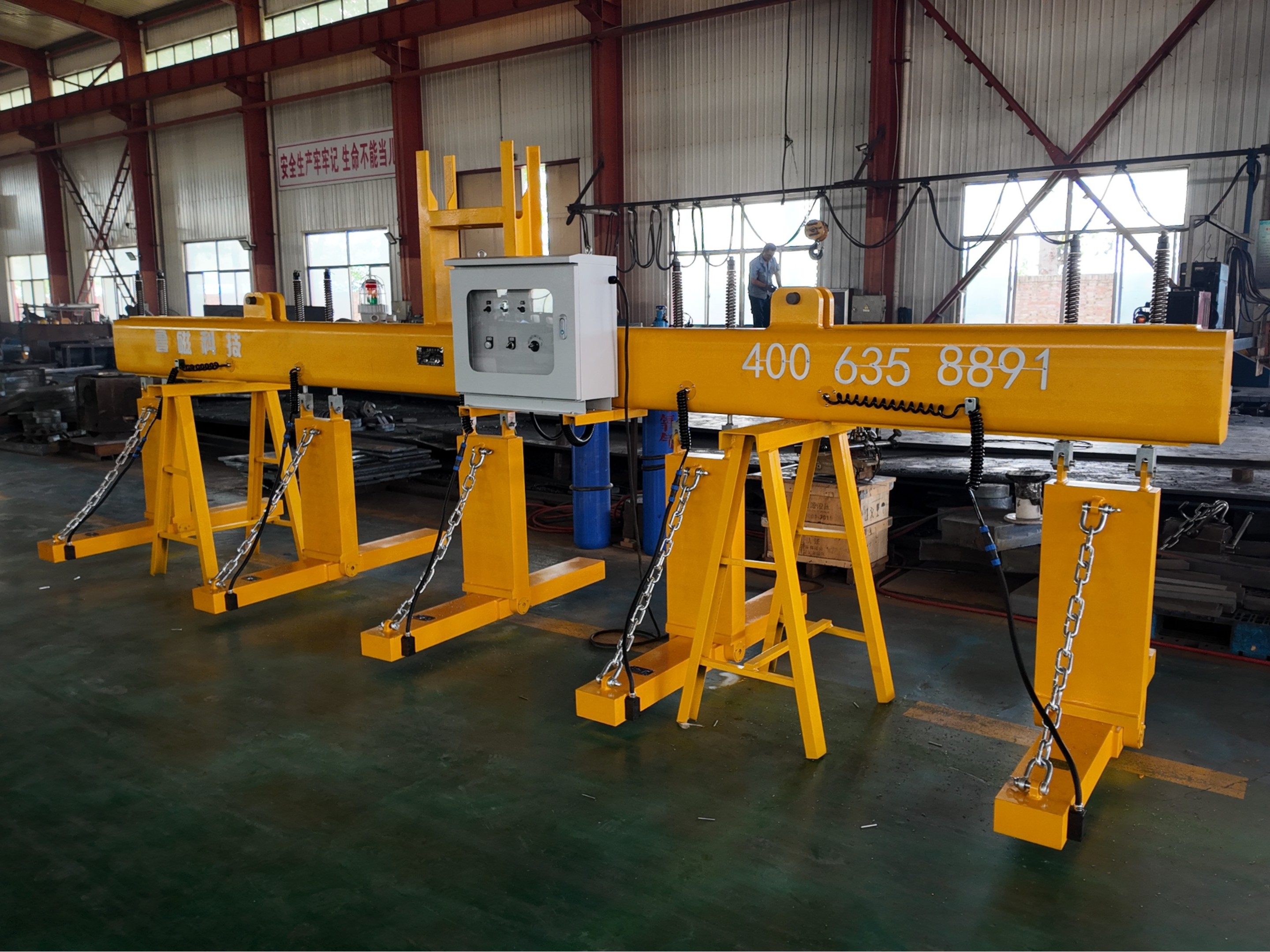 通电消磁电永磁吊具的原理 通电消磁电永磁吊具的原理